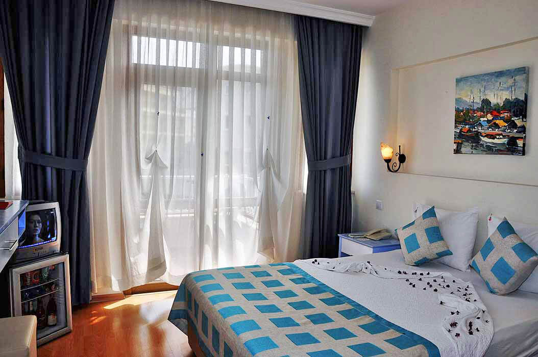 Tu Casa Gelidonya Hotel - przykładowy pokój standardowy z łóżkiem małżeńskim